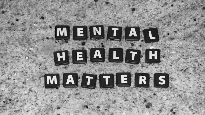 Black tiles spelling Mental Health Matters on a grey background